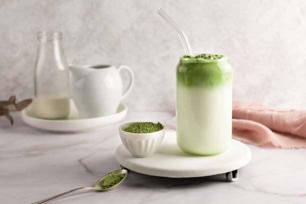 istock Whipped grean tea with milk, dalgona matcha latte in glass. 1366455623