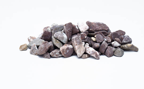 istock Crushed stone. Isolated on a white background. Wide application in construction, on a garden plot. 1366456410