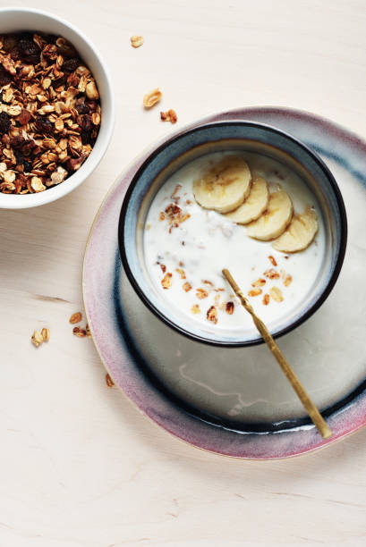 istock Granola with yogurt and bananas. 1366456543