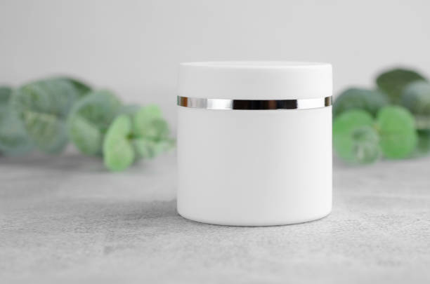 istock Closed white jar of moisturizer. Moisturizing cream white packaging mockup. The concept of natural cosmetic products 1366456746