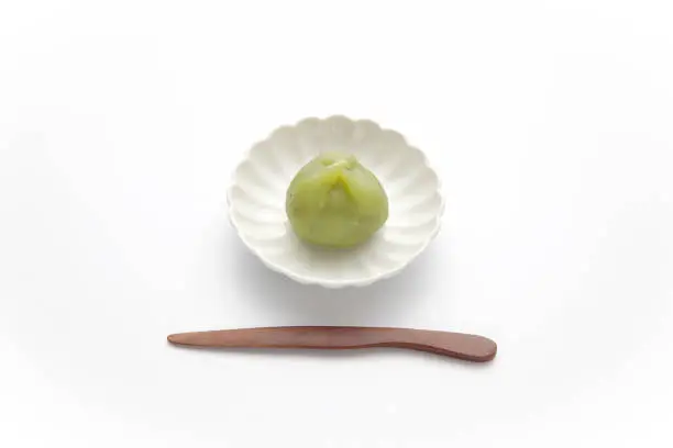 mugwort rice cake kusamochi Japanese confectionery isolated on white background