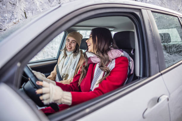 istock Young women on a winter road trip 1366462759