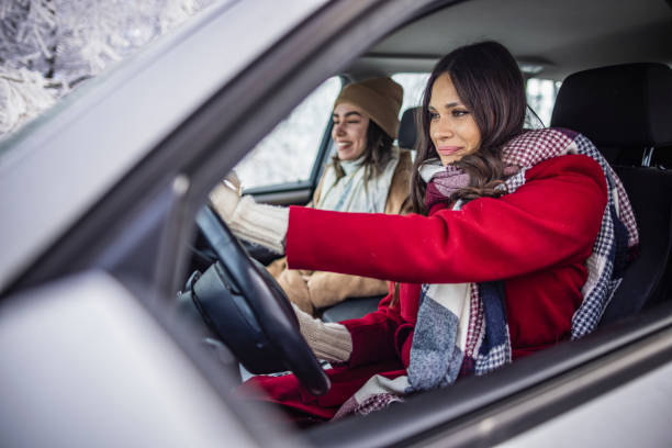 istock Young women on a winter road trip 1366462783