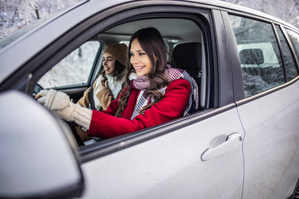 istock Young women on a winter road trip 1366462882