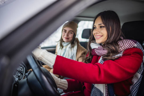 istock Young women on a winter road trip 1366462908