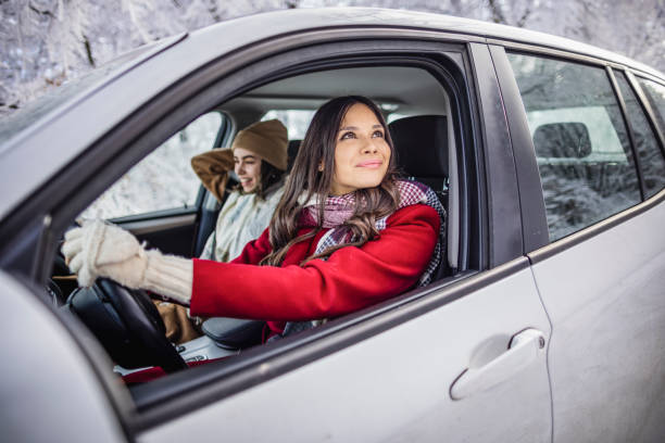 istock Young women on a winter road trip 1366463142