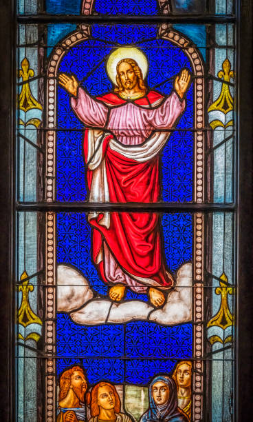 Jesus Ascension Stained Glass Church Saint Augustine Florida Ascension Jesus Christ Ascending to Heaven Stained Glass Trinity Episcopal Parish Church Saint Augustine Florida.  Founded in the 1700s. Stained glass from mid-1800s anglican stock pictures, royalty-free photos & images