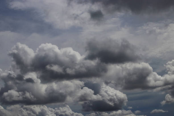 istock Dramatic dark clouds is about to rain with blue sky background in the midday 1366463259