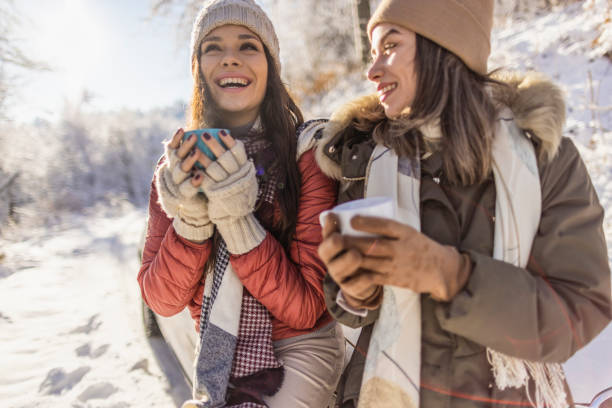 istock Friends drinking hot tea on a winter day 1366464830