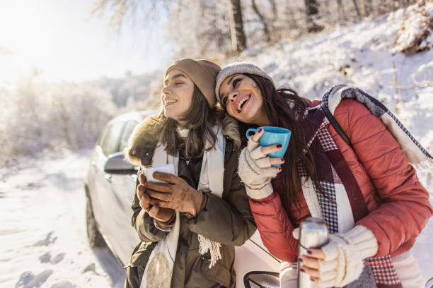 istock Friends drinking hot tea on a winter day 1366465127