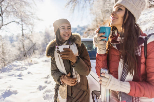 istock Women drinking hot tea on a cold day 1366465463