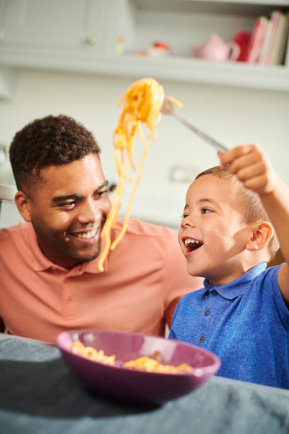 istock fun mealtime family 1366466054