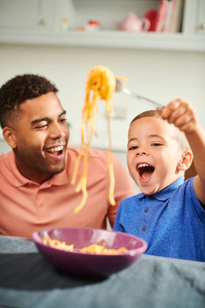 istock fun mealtime family 1366466131