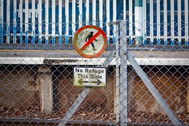 istock 'No Refuge This Side' sign on a railway line 1366466202