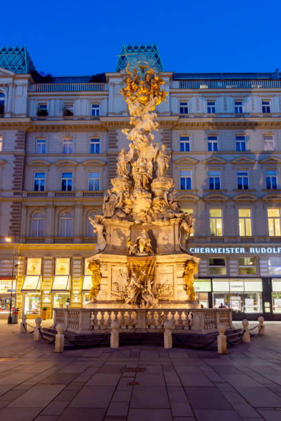 istock Plague Column (Trinity column) on Graben street at night, Vienna, Austria 1366475273