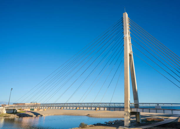 Fuengirola cable Armada bridge over Fuengirola river  in Costa d Fuengirola cable Armada bridge over Fuengirola river  in Costa del Sol of Malaga in Spain armada stock pictures, royalty-free photos & images