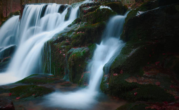 istock Wild brook with stones and waterfall in Jeseniky mountains 1366478654