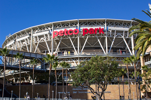 Low angle view of the PETCO Park Sign on the outside of the PETCO Park baseball park in downtown San Diego, California. November 26, 2021