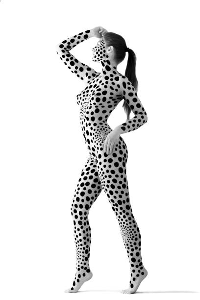 A woman with geometric black and white body painting