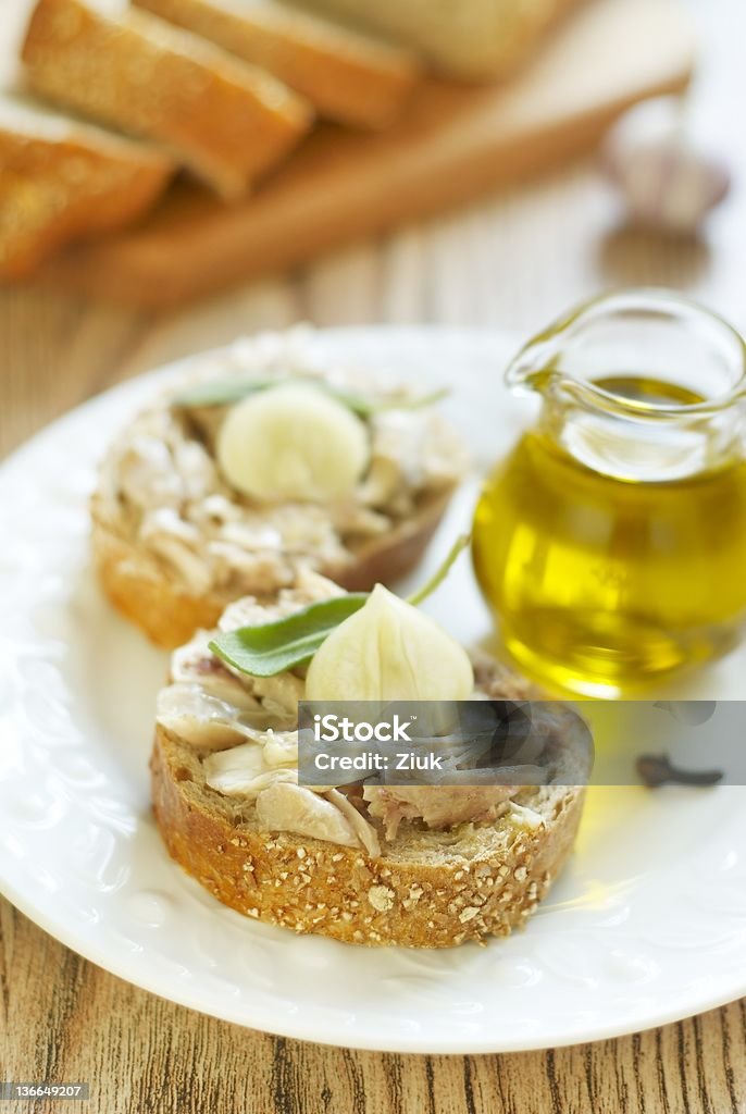 Sandwich with rabbit meat, garlic and sage Tasty sandwich with rabbit meat, garlic and sage Bread Stock Photo