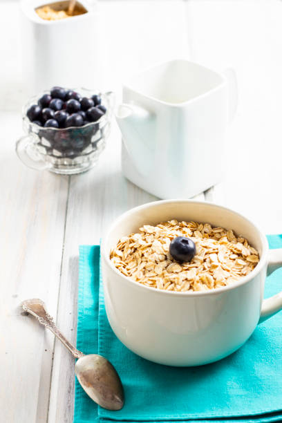 A bowl of Oatmeal sits on a table