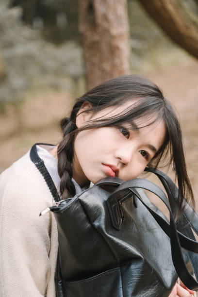 istock Asian women resting on benches 1366495977