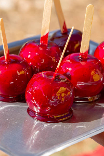 Brazil street food: caramel apples on the stick, typical of Brazilian street parties