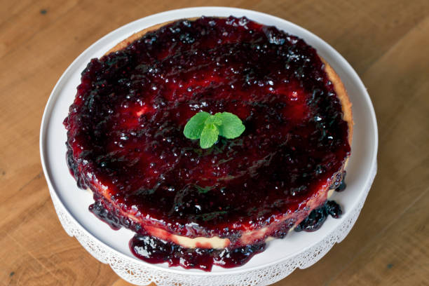 istock Cheesecake with jam cover in white tray decorated 1366501866