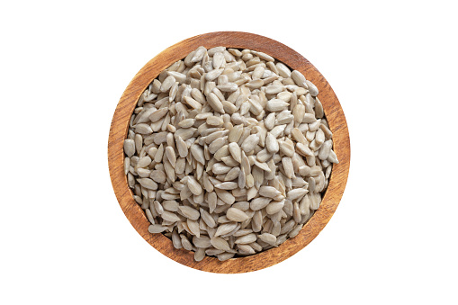Variety of seeds bowl on white quartz counter top