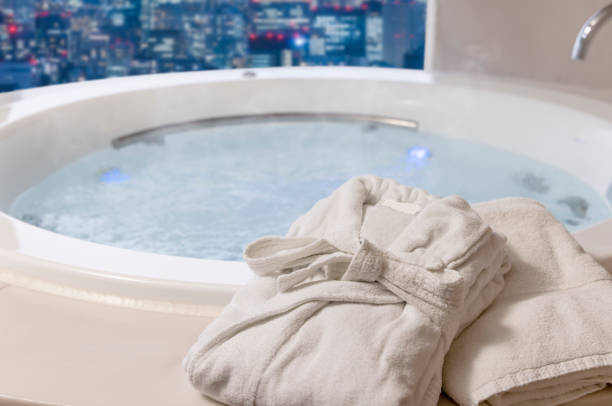 istock Bathrobes and a relaxing whirlpool 1366504977