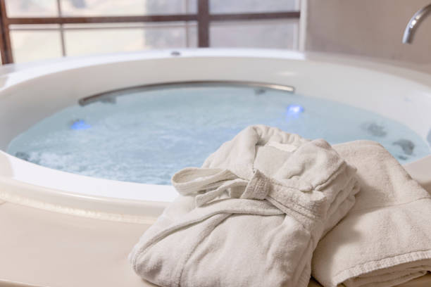 istock Bathrobes and a relaxing whirlpool 1366504988