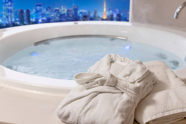 istock Bathrobes and a relaxing whirlpool 1366504994