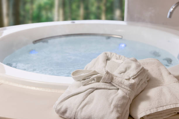 istock Bathrobes and a relaxing whirlpool 1366505042