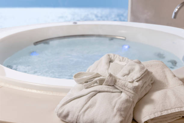istock Bathrobes and a relaxing whirlpool 1366505069