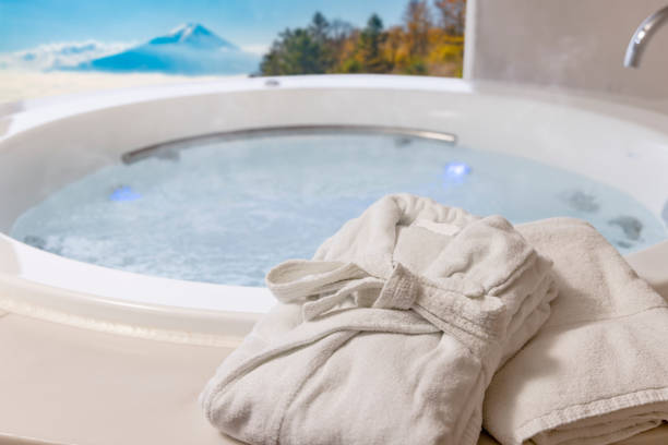 istock Bathrobes and a relaxing whirlpool 1366505131