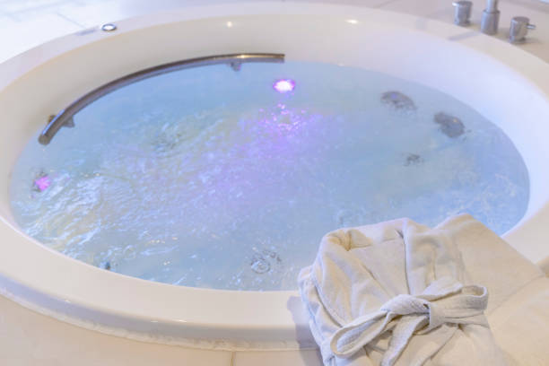 istock Bathrobes and a relaxing whirlpool 1366505145