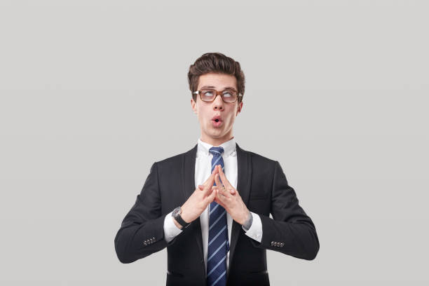 istock Funny businessman meditating with rolled eyes 1366505382