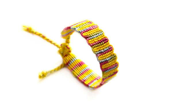 istock DIY woven friendship bracelet  on white background 1366509112