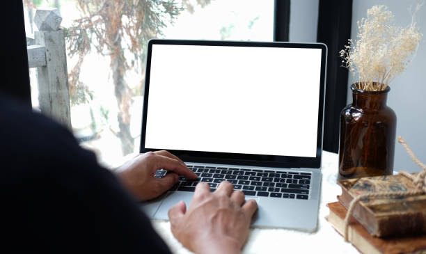 istock Young man freelancer working with laptop computer at home. 1366512911