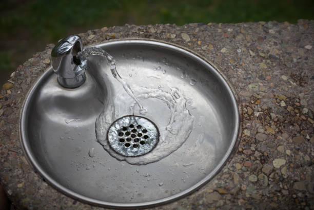 istock steel drinking water basin and stone drinking faucet 1366516127