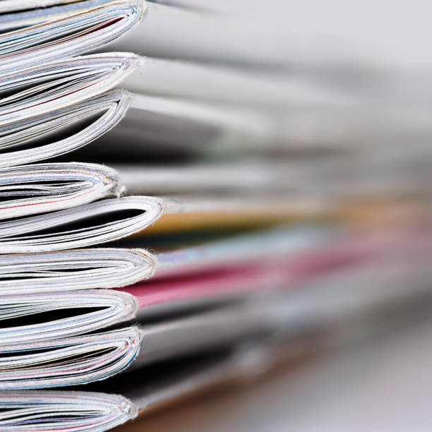 istock Stack of magazines that progressively blurs toward the right 1366516912