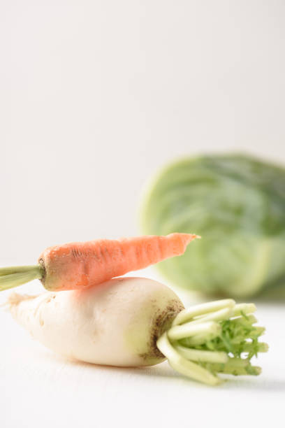 White radish, carrot and cabbage on white background. Organic vegetable from Thai farmer in local market
