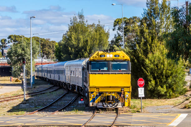 istock Overland Passenger Train arriving in city terminal 1366520826