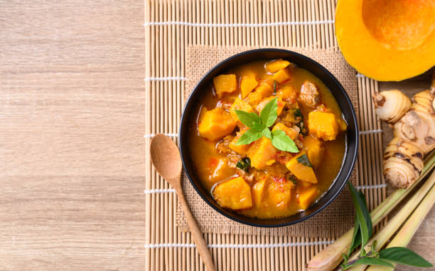 istock Thai spicy pumpkin curry soup with pork 1366521567