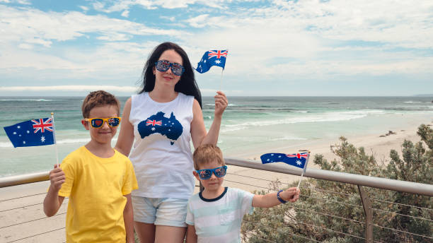 istock Mother and sons with Australian flags celebrating Australia Day 1366528074