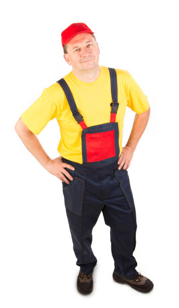 istock The worker stands arms akimbo. 1366531503