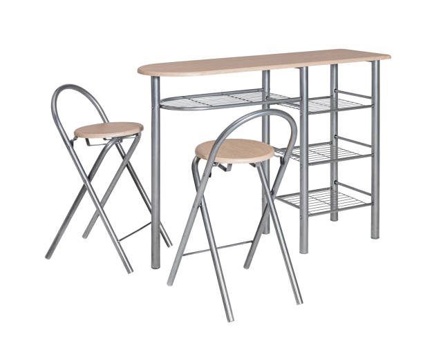 istock Modern wooden table with two chairs isolated on white background 1366535540