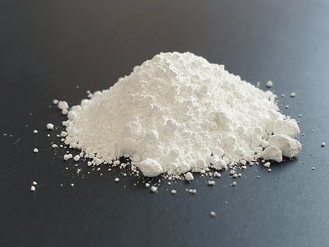 Titanium Dioxide TiO2 White Pigment Powder on Black