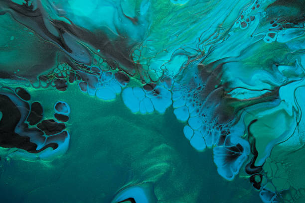 istock Fluid Art. Metallic Green and blue abstract wave swirls on black background. Marble effect background or texture 1366537314