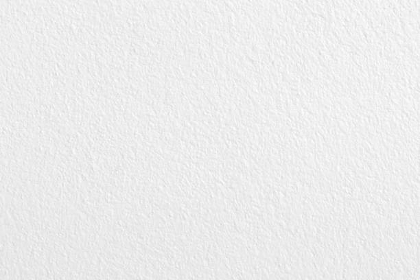 istock White grey concrete cement wall texture for background and design art work. 1366537337